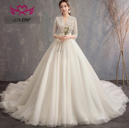 3/4 Sleeves Heavy Pearls Beading Wedding Dress Queen Backless High Stand Collar Tulle Train Wedding Gowns